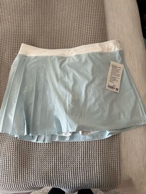 Lululemon asymmetrical Light Blue Pleated Skirt with White Waistband